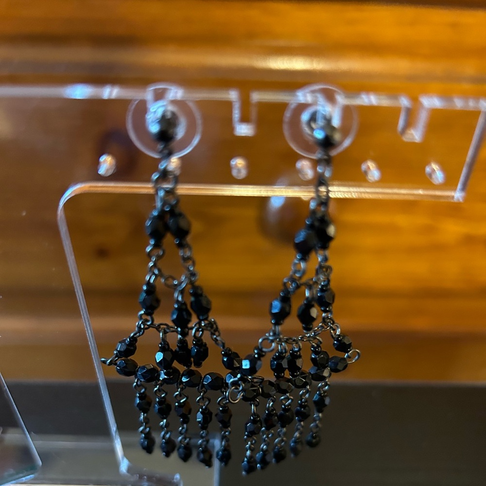3 inches long, chandelier 2 tier black beaded earrings.